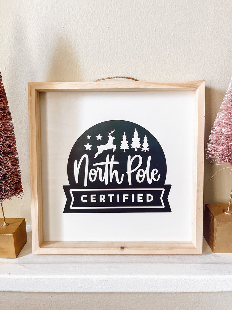 North Pole certified framed wood sign