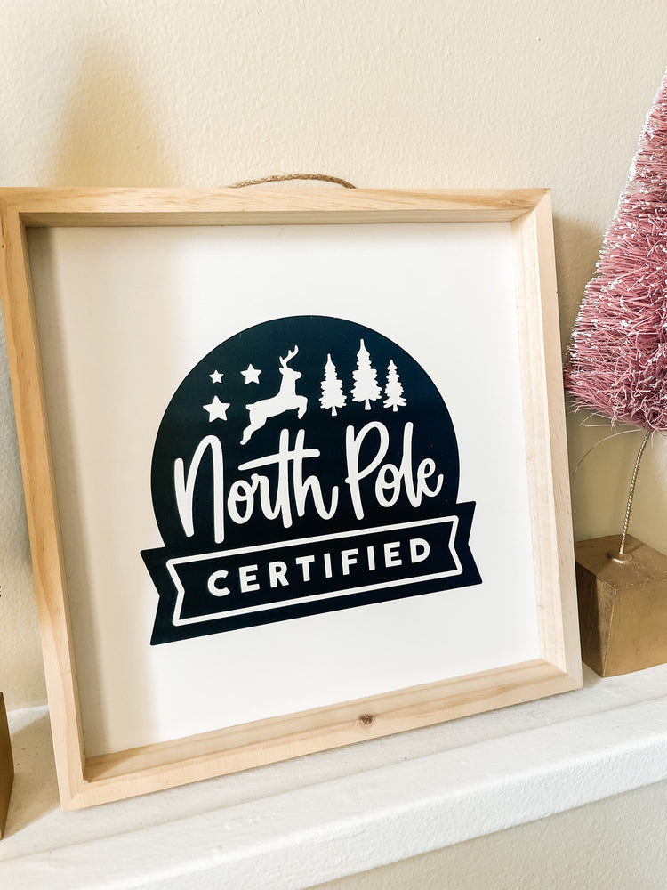 North Pole certified framed wood sign